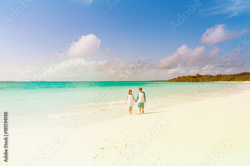 happy loving couple enjoy tropical beach