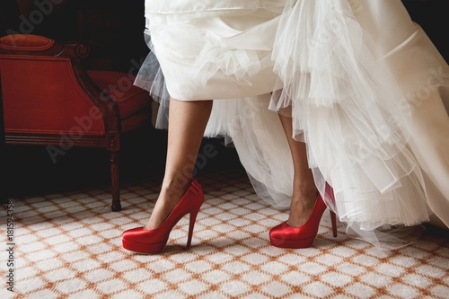 Bride in red shoes
