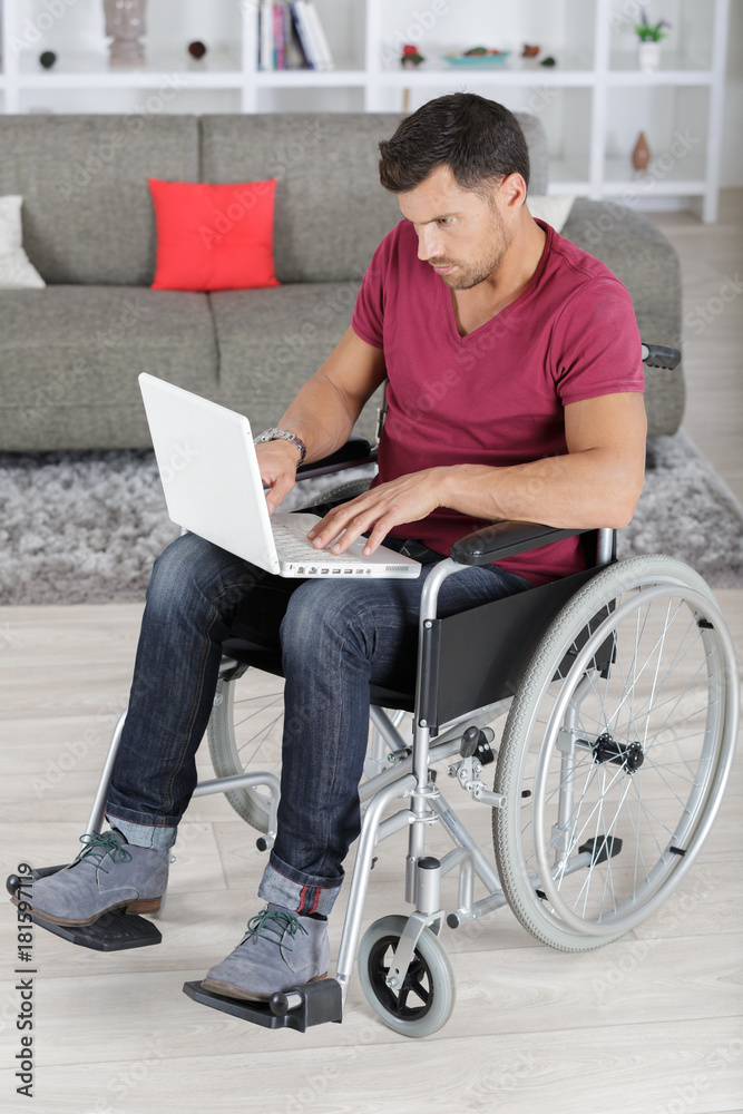 young disabled businessman working from home