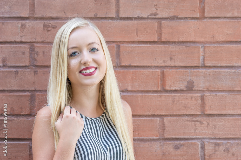 Portrait of a young Woman in front of a Wall Portrait of a young Woman in front of a Wall