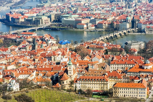 Prague panoramic aerial view of the cityscape with Charles bridge and Vltava river, Czech Republic