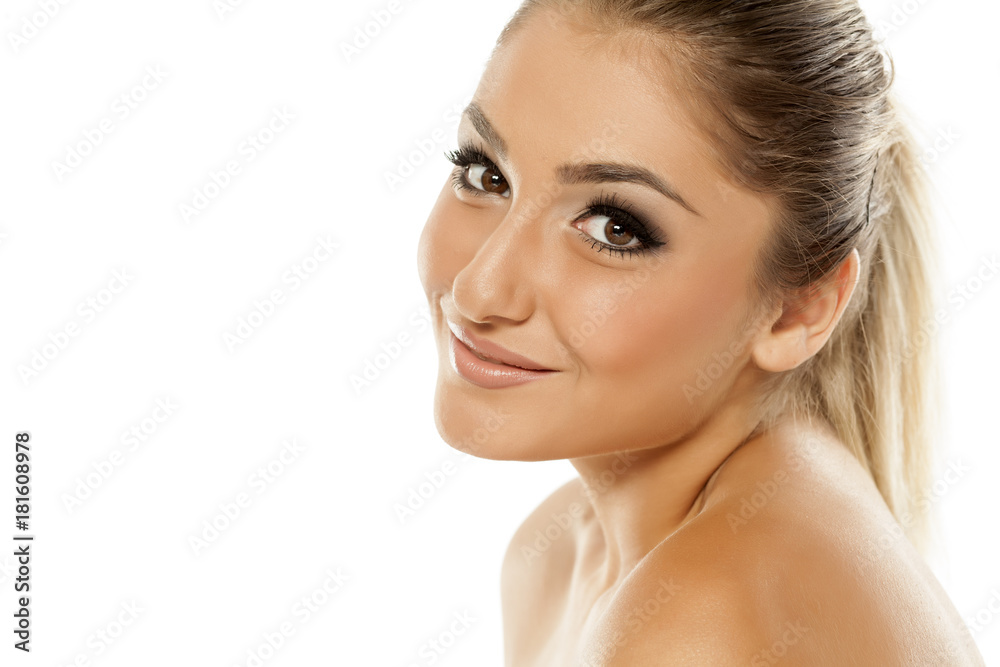 Portrait of beautiful young woman with makeup on white background Portrait of beautiful young woman with makeup on white background
