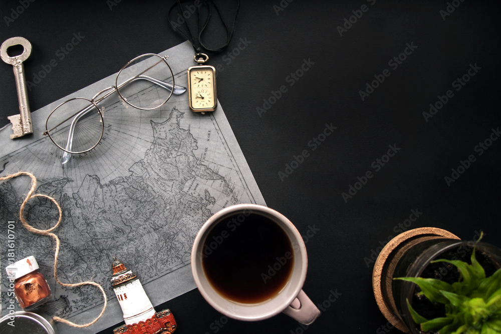 travel and discoveries mood , trip vacation, tourism of compass . a Cup of hot beverage, a vintage key, a watch, souvenir lighthouse travel and discoveries mood , trip vacation, tourism of compass . a Cup of hot beverage, a vintage key, a watch, souvenir lighthouse
