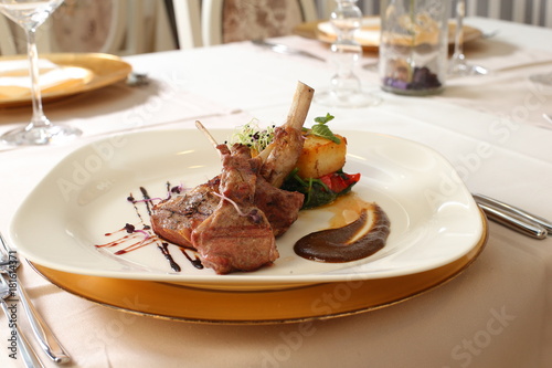 Restaurant meal, meat dish and vegetables plating