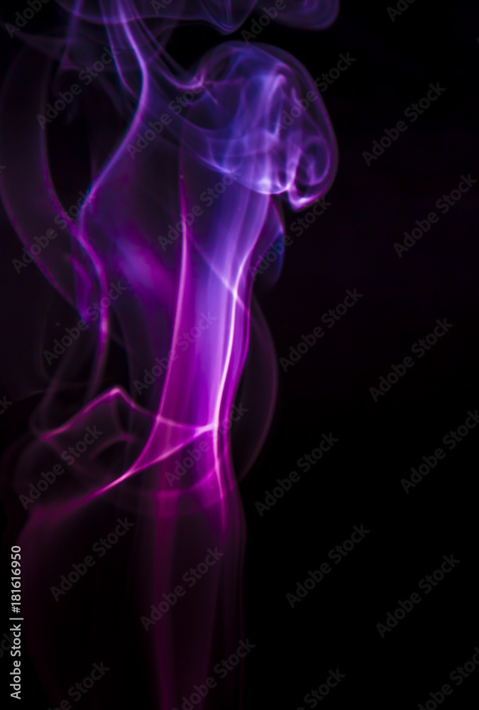 Colored smoke on black background