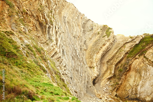 Ruin and land slided mountain scene.