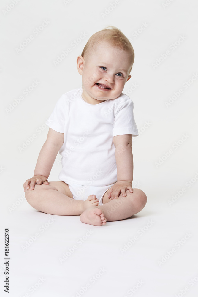 Cutie baby boy in white studio, portrait Cutie baby boy in white studio, portrait