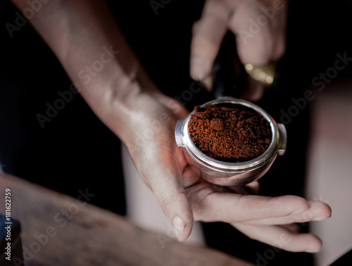 Coffee powder in espresso scoop, Focused at coffee scoop