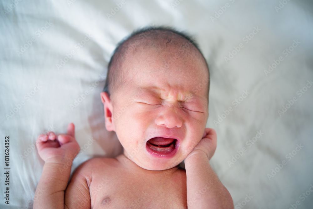 Asian new born baby boy crying Asian new born baby boy crying
