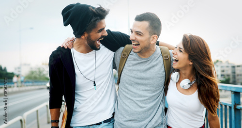 Group of happy friends hang out together photo