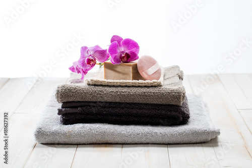 Refreshing female shower concept with textured towels and solid soap