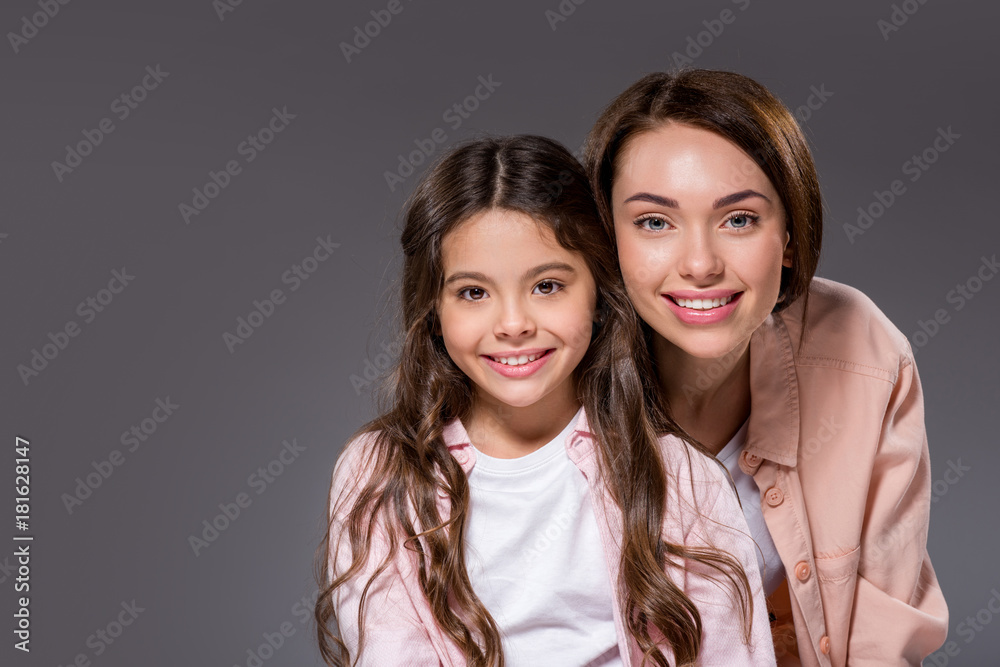 Smiling Mother and daughter