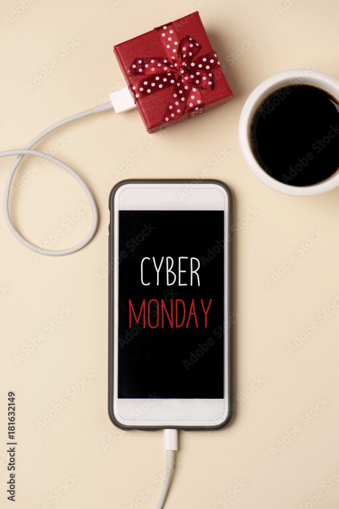 gift and text happy cyber monday in a smartphone