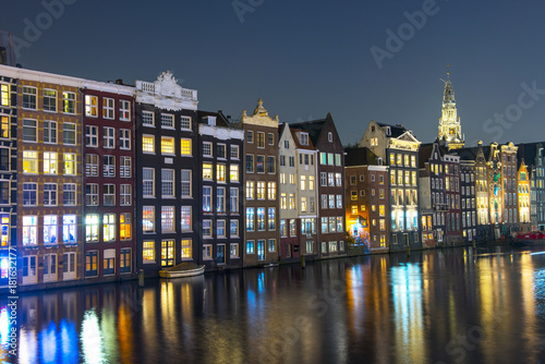 Amsterdam City Center. Beautiful view of Amsterdam Canals with Bridge and typical Dutch Houses. Amsterdam, Netherlands.