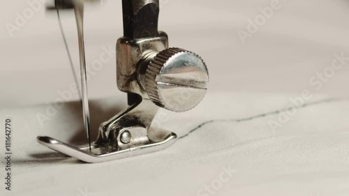 Old sewing machine in work process