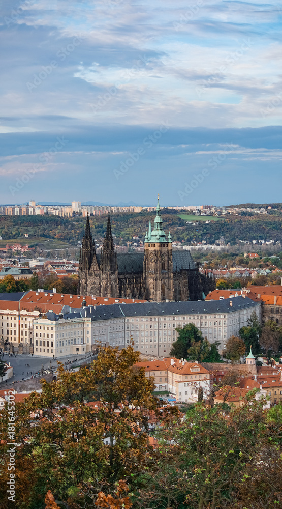 Aerial view of the Old Town architecture with red roofs in Prague , Czech Republic. St. Vitus Cathedral in Prague.