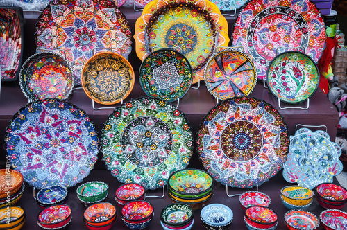 Colorful ceramic plates. Souvenir marketplace