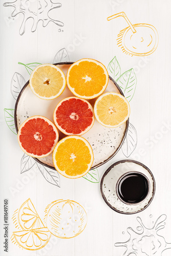 Freshness of summer. Top view of fresh citrus fruits lying on the table and cup of coffee standing nearby