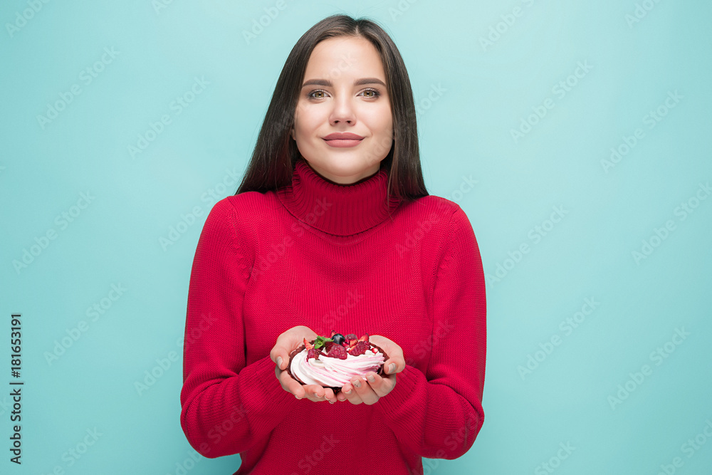 Beautiful women holding small cake. Birthday, holiday.