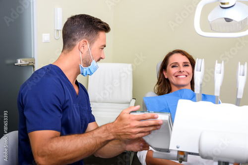 A Dentist attending a female Patient  © Spectral-Design