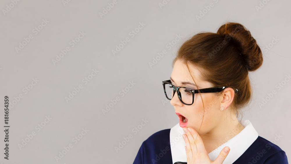 Shocked business woman wearing eyeglasses Shocked business woman wearing eyeglasses