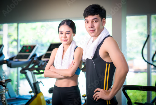 Beautiful young sports people at the gym looking very attractive,Fitness Concept,Lifestyle and people concept
