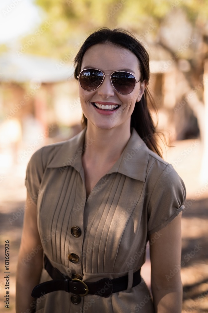 Portrait of smiling woman in sunglasses Portrait of smiling woman in sunglasses