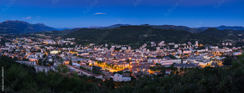 Elevated panoramic view of the City of Gap at twilight. Hautes-Alpes, Southern French Alps, France