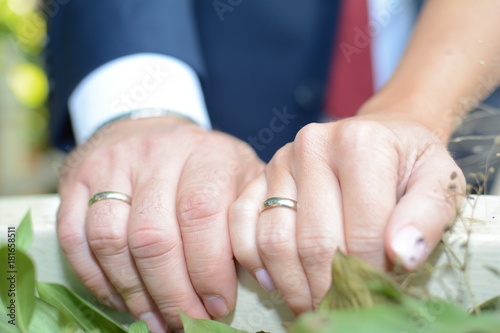 Just married couple showing rings