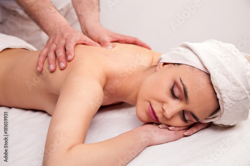  Young woman is having a massage