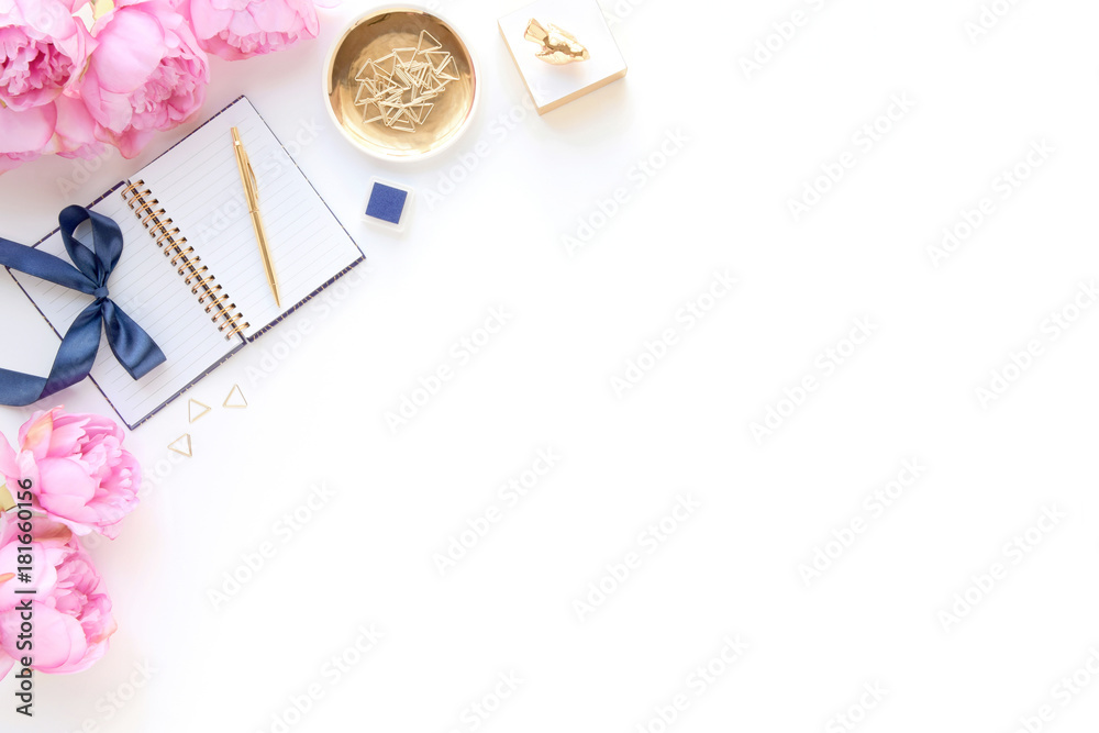 Fototapeta premium Styled desk scene with gold, navy and pink, feminine workplace, flat