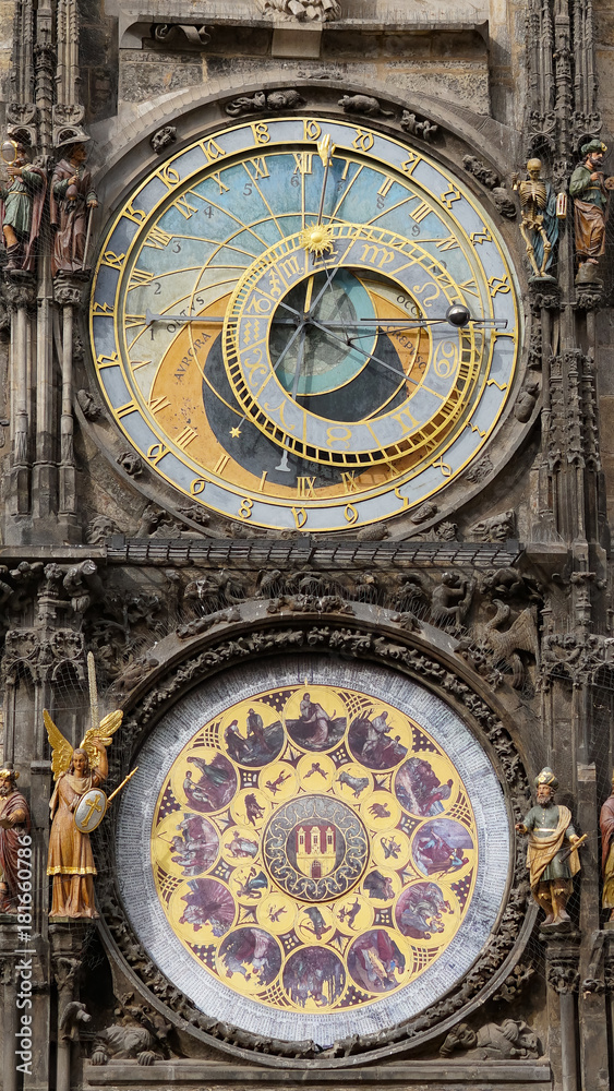 Obraz premium Astronomical Clock Tower detail in Old Town of Prague, Czech Republic. Astronomical clock was created in 1410 by the watchmaker Mikulas Kadan and mathematician-astronomer Jan Schindel.