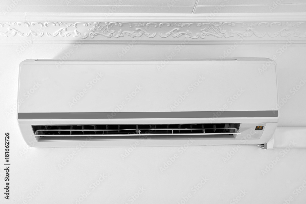 Air conditioner on wall in modern flat Air conditioner on wall in modern flat