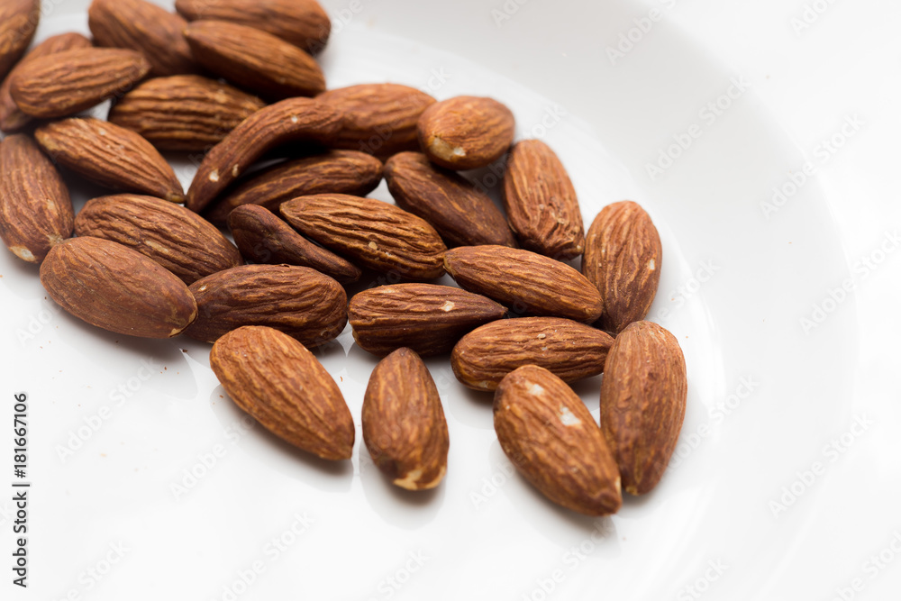 Closeup of almonds, isolated on the white background Closeup of almonds, isolated on the white background