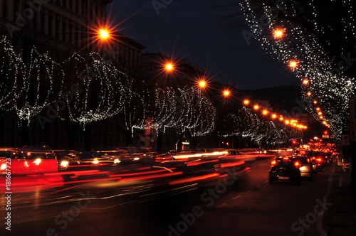 Lightstrails of vehicles in movement on the road in Florence city. Italy