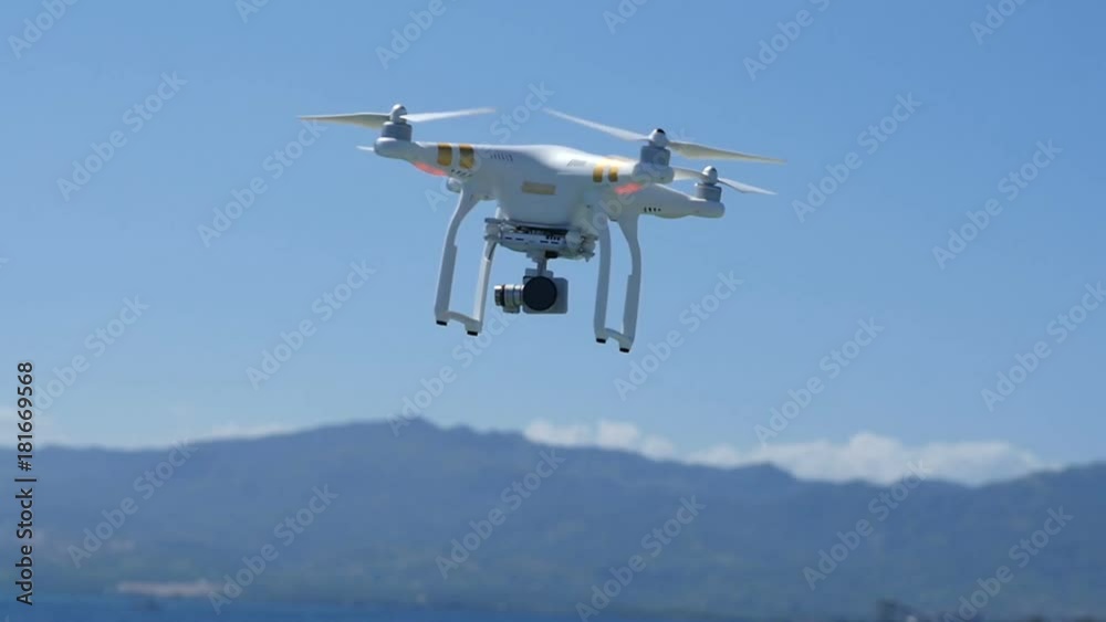 small drone being used to carry out aerial filming in the Philippines small drone being used to carry out aerial filming in the Philippines