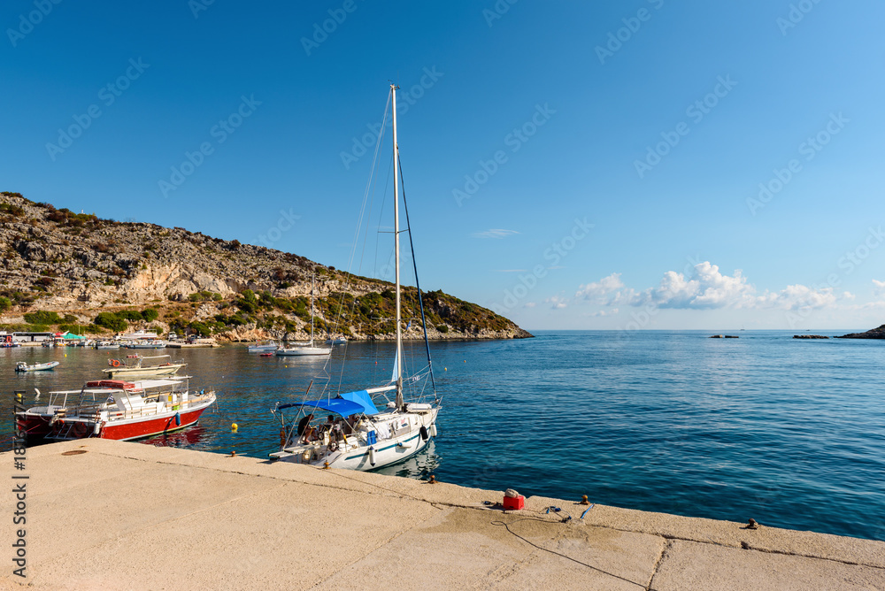 Yachts and boats moored in Agios Nikolaos bay on Zakynthos island, Greece.