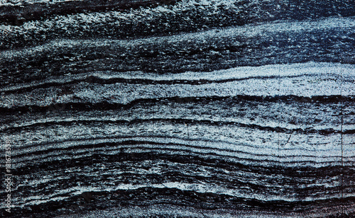 Jaspelite Quartzite mineral stone texture macro view. Black gray natural pattern metamorphic rock