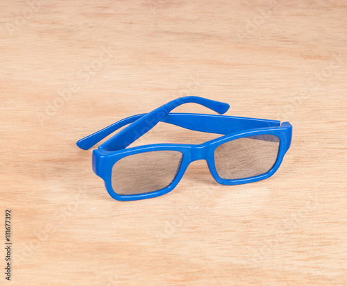 glasses blue on the wooden background