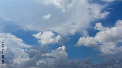 Fototapeta Naklejka Na Ścianę i Meble -  White fkuffy small clouds on the light-blue sky