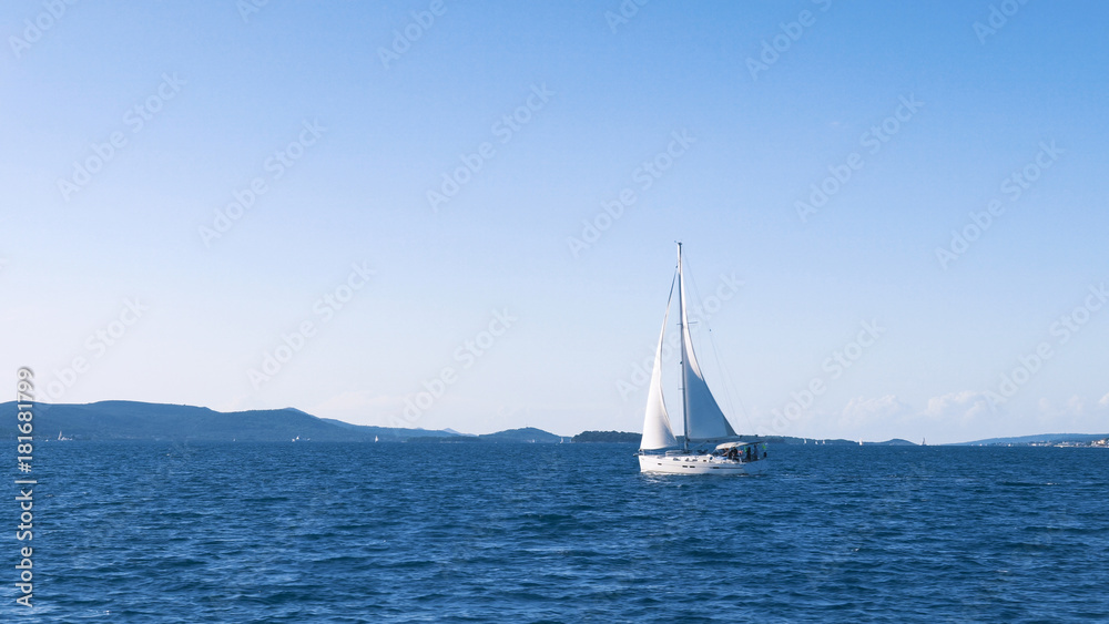 Obraz premium Sailing. Ship yachts with white sails in the Sea. Luxury boats. Boat competitor of sailing regatta.