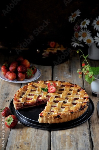 Strawberry pie and fresh strawberries