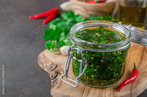 Traditional argentinian chimichurri sauce made of parsley, cilan