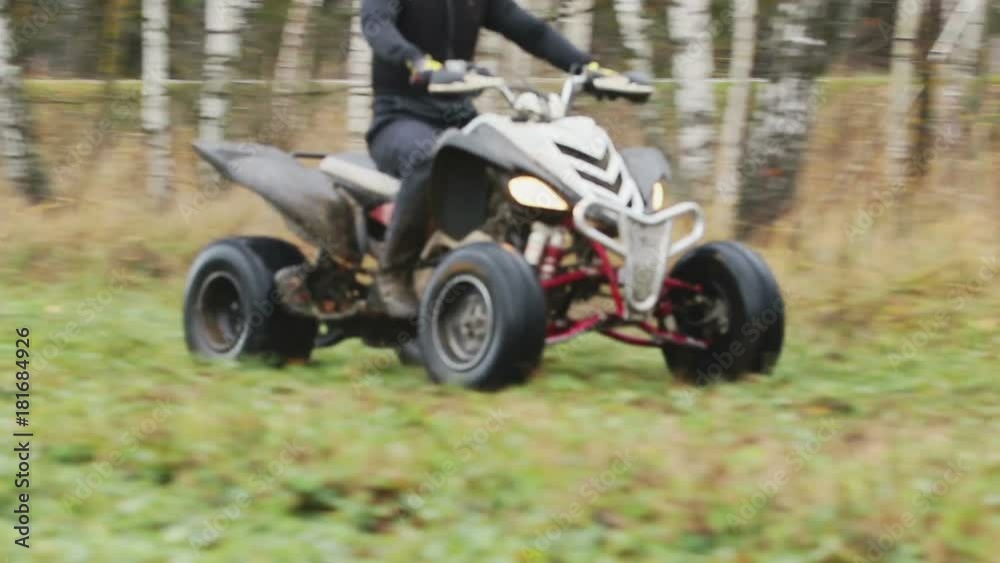 the guy with the mask on her face riding her ATV the guy with the mask on her face riding her ATV