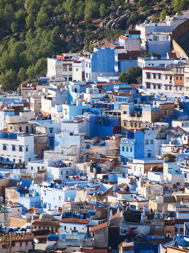The gorgeous blue streets and blue-washed buildings of Chefchaouen, the moroccan blue city - amazing palette of blue and white buildings © Natalia Schuchardt