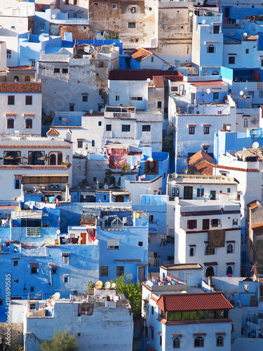 The gorgeous blue streets and blue-washed buildings of Chefchaouen, the moroccan blue city - amazing palette of blue and white buildings © Natalia Schuchardt