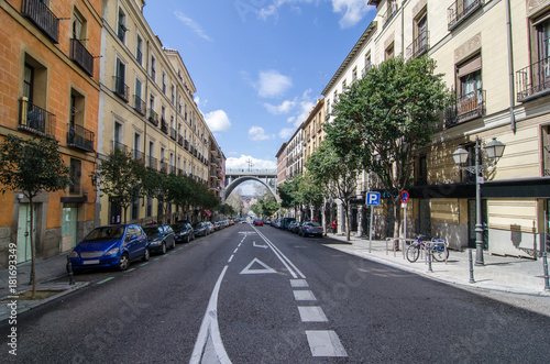 Street in Madrid downtown with Segovia bridge at the end © Juan Carlos Alonso