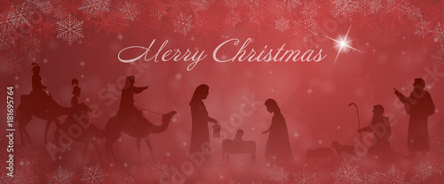 Christmas time. Nativity scene with Mary, Joseph, baby Jesus, shepherds and three kings in Christmas landscape.