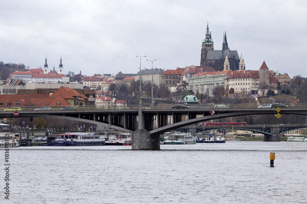 Fototapeta premium View on the autumn Prague gothic Castle above River Vltava, Czech Republic