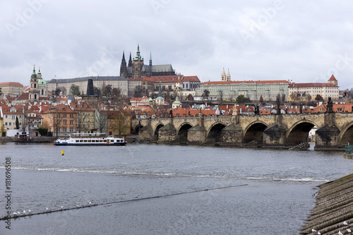 View on the autumn Prague gothic Castle with the Charles Bridge, Czech Republic
